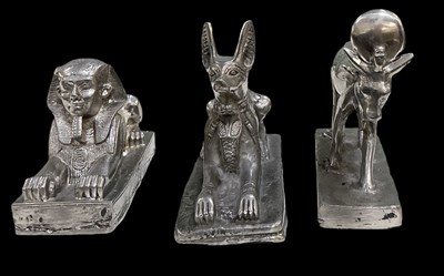 Lot 444 - Three Egyptian Revival pewter figures...