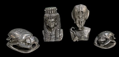 Lot 445 - Four assorted Egyptian Revival pewter figures,...