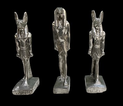 Lot 446 - Three Egyptian Revival pewter figures,...