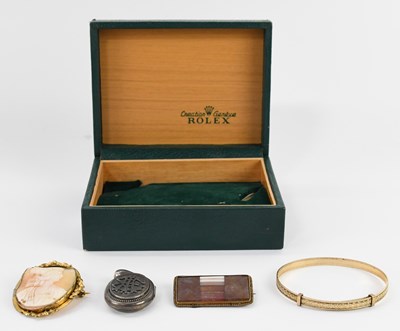 Lot 1837 - ROLEX; a vintage green leather effect Rolex...