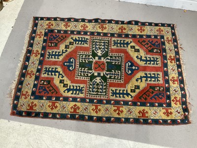 Lot 181 - A yellow ground Eastern style hand knotted...
