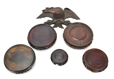 Lot 346 - A collection of five Oriental circular wooden...