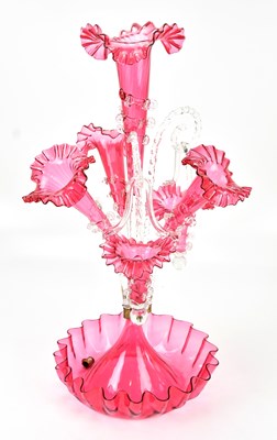 Lot 1472 - A Victorian cranberry glass epergne with three...