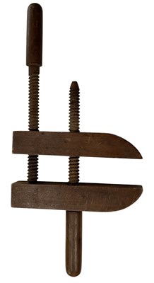 Lot 509 - A 19th century turned wooden carpenter's vice,...