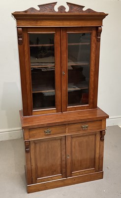 Lot 103 - An Edwardian mahogany bookcase, with two...