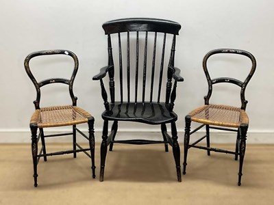 Lot 661 - A pair of ebonised side chairs with mother of...