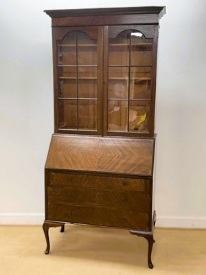 Lot 663 - A 19th century glazed mahogany bookcase on...
