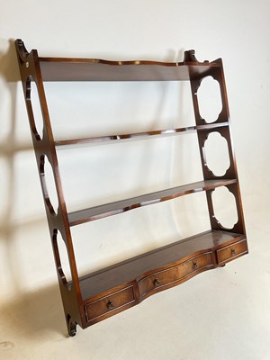 Lot 741 - A set of early 29th century wall shelves with...