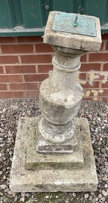 Lot 697 - A composite stone sundial, on a plinth, height...