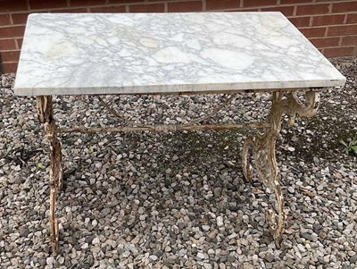 Lot 691 - A mid century cast iron and marble topped...