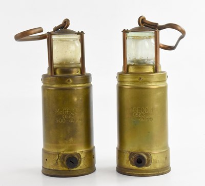 Lot 379 - Two McGeoch miner's lamps, height 26cm.