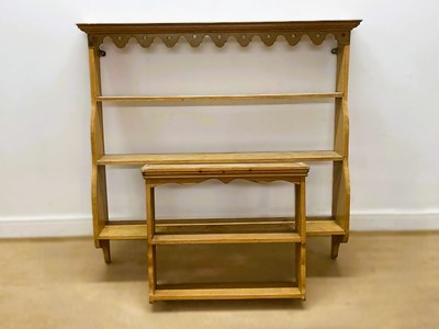 Lot 629 - Pine wall shelving with scalloped edging to...
