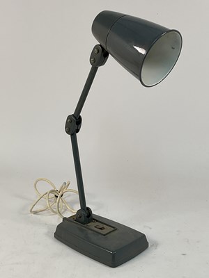 Lot 554 - MEMLITE; an industrial articulated desk lamp,...