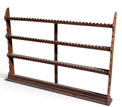 Lot 30 - An 18th century carved oak open plate rack,...