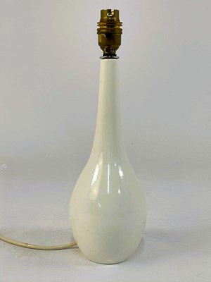 Lot 557 - POOLE POTTERY; a shape 697 table lamp from the...