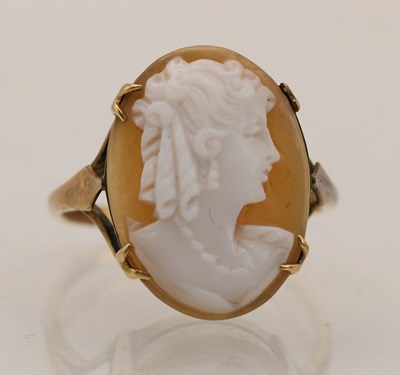 Lot 1446 - A 9ct rose gold cameo set ring, size J/K,...