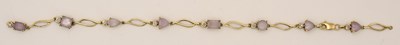 Lot 1547 - A modern amethyst and tiny diamond set...