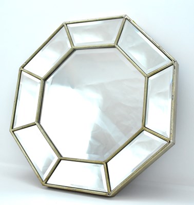 Lot 138 - A large octagonal mirror with a central...