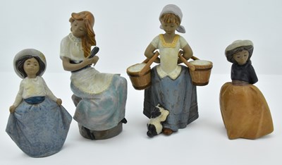Lot 786 - Four Spanish terracotta figures comprising a...