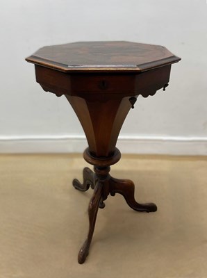 Lot 601 - A 19th century rosewood octagonal sewing table...