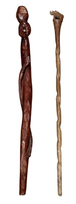 Lot 1071 - An African tribal carved wooden figural...