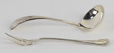 Lot 1266 - A George V hallmarked silver sauce ladle,...
