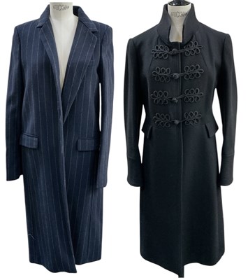 Lot 684 - A lady's black 80% woollen coat, with...