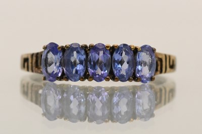 Lot 1433 - A 9ct yellow gold dress ring set with five...