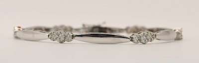Lot 1537 - A modern 14ct white gold bracelet, consisting...