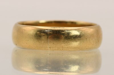 Lot 1411 - A 9ct yellow gold band ring, size P, approx...