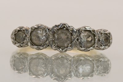 Lot 1420 - An 18ct yellow gold white stone set dress ring,...