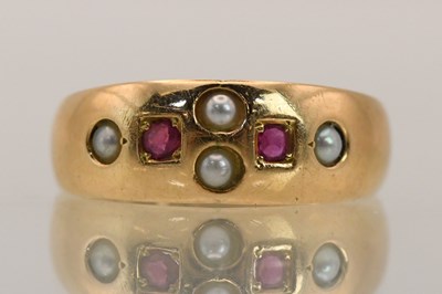 Lot 1421 - A 15ct yellow gold ruby and seed pearl flush...