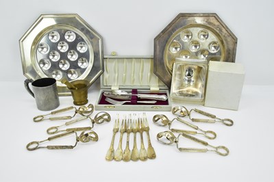 Lot 1099 - A pair of silver plated snail dishes, width 24....