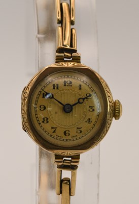 Lot 1836 - A 9ct rose gold lady's wristwatch, the...