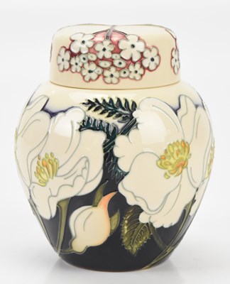 Lot 386 - MOORCROFT; a small ginger jar and cover with...