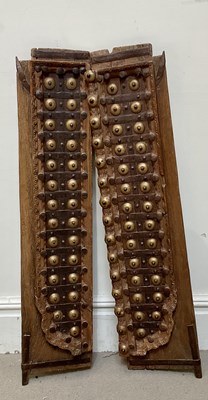 Lot 663 - A pair of Indian window shutters, decorated...
