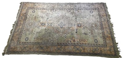 Lot 687 - An Eastern hand woven rug, with a central...