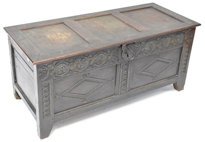 Lot 24a - An 18th century carved oak coffer with later...