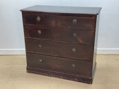 Lot 618 - A stained pine chest of two short over three...
