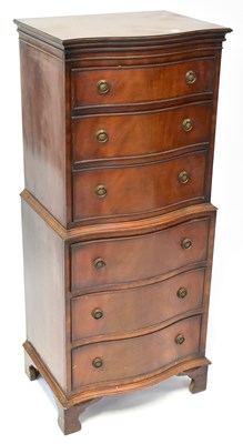 Lot 26a - A Regency-style serpentine fronted chest on...