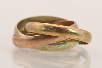 Lot 1393 - A Russian 9ct yellow gold tricolour three band...