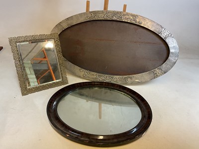 Lot 795 - An Art Nouveau style hammered pewter oval...