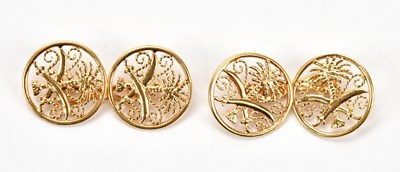 Lot 584 - A pair of Chinese yellow metal cufflinks, with...