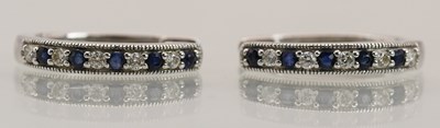 Lot 1505 - A pair of 9ct white gold small hoop earrings,...