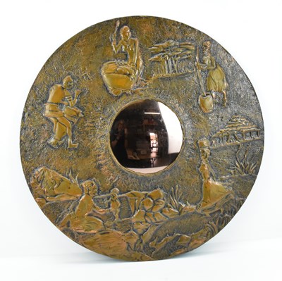 Lot 136 - A vintage circular African themed mirror, with...