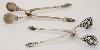Lot 1262 - Two pairs of modern sterling silver sugar nips,...