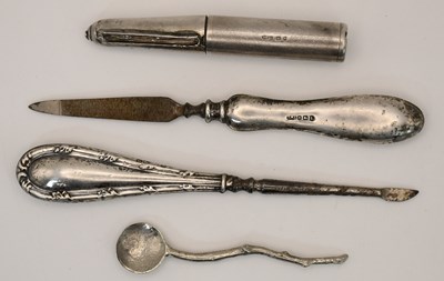Lot 1263 - A George V hallmarked silver handled nail file,...