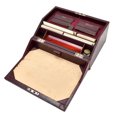 Lot 342 - A red leather stationery box with fitted...
