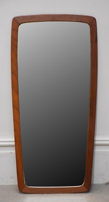 Lot 59 - A Danish teak framed wall mirror of shaped...