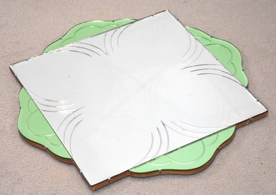 Lot 233 - An Art Deco green and clear glass wall mirror...